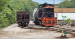 AB 1502 passes the empty stone cars as she shoves toward Brittain Yard.